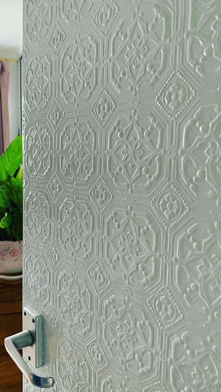 white wallpaper door